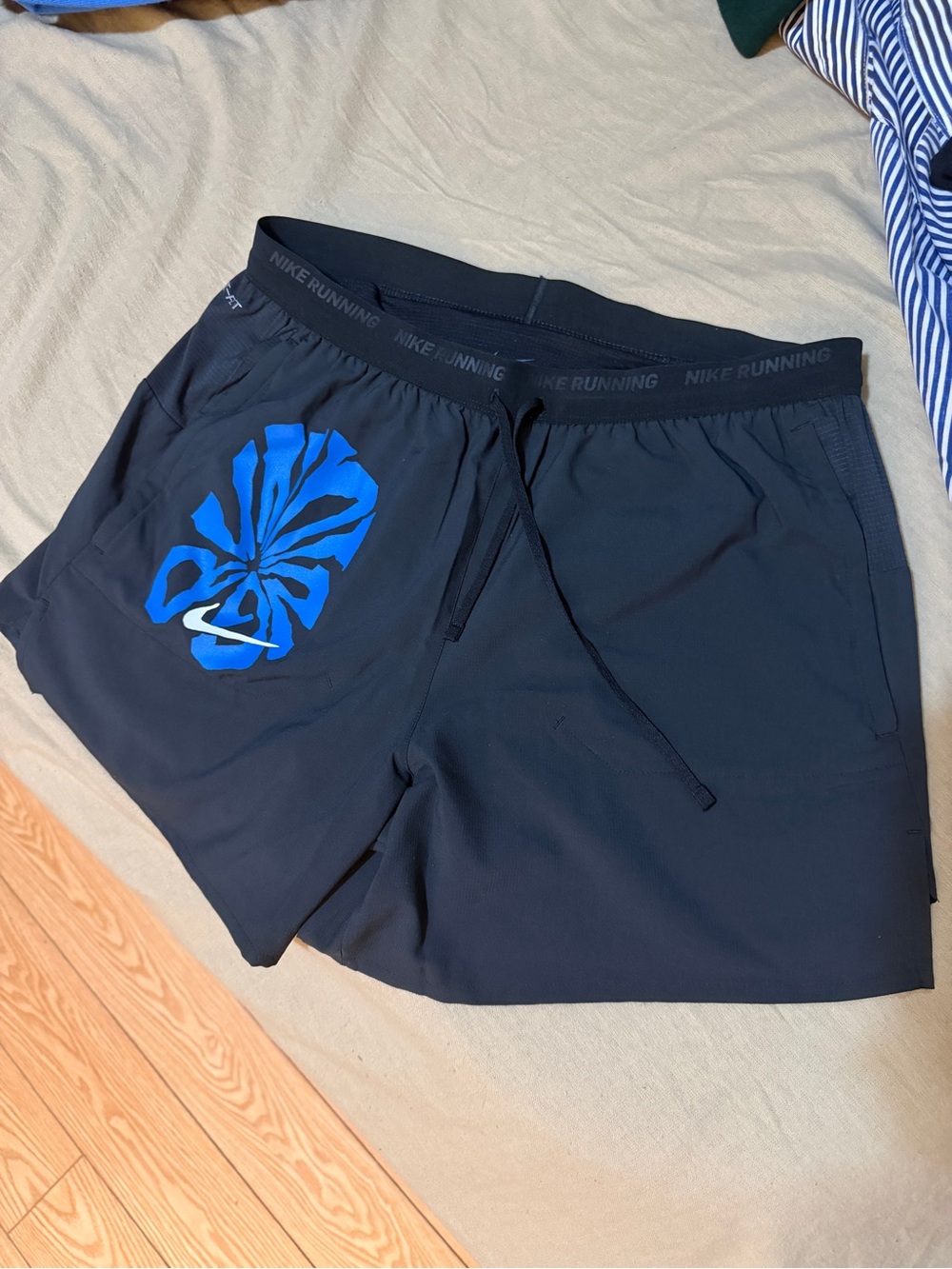 Nike Men’s Black Athletic Shorts with Blue Graphic